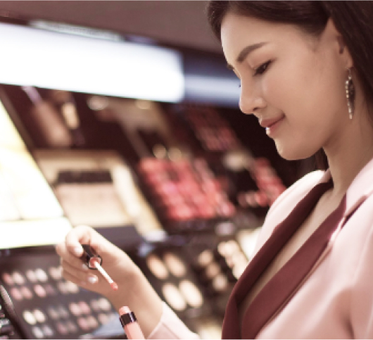 Student raising hand in classroom